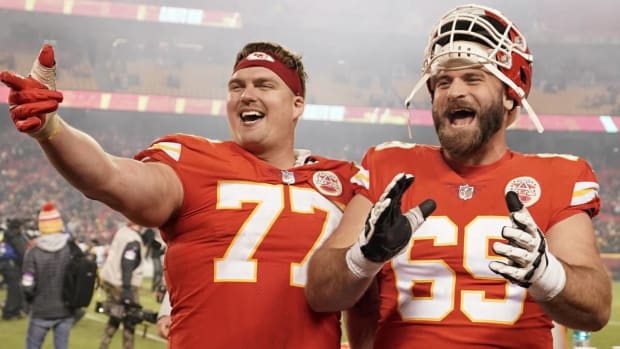 Andrew Wylie and Kyle Long celebrate a win.